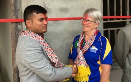 DEDICATED: Hike Himalaya Adventure director Prakash Aryal and Mary Brell at a handing over of keys for a new a building built by Nepali people and financed by Rotary.
