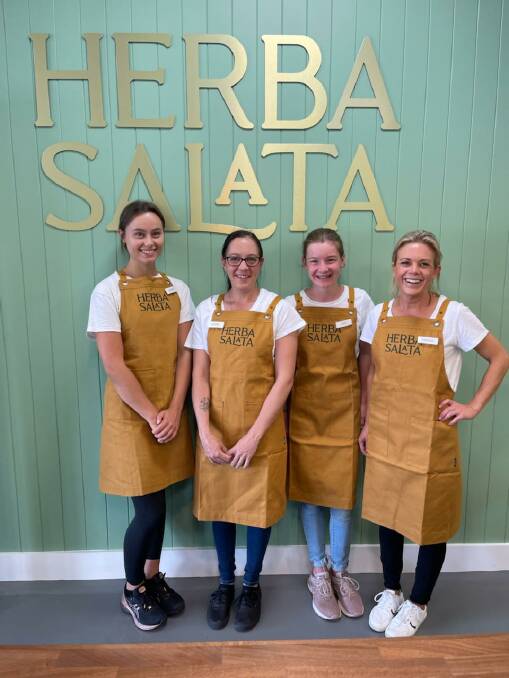 OPEN: Herba Salata employees Scarlet Taragel, Elisha Davis, Ava Petersen, owner Ophelia Heffernan.