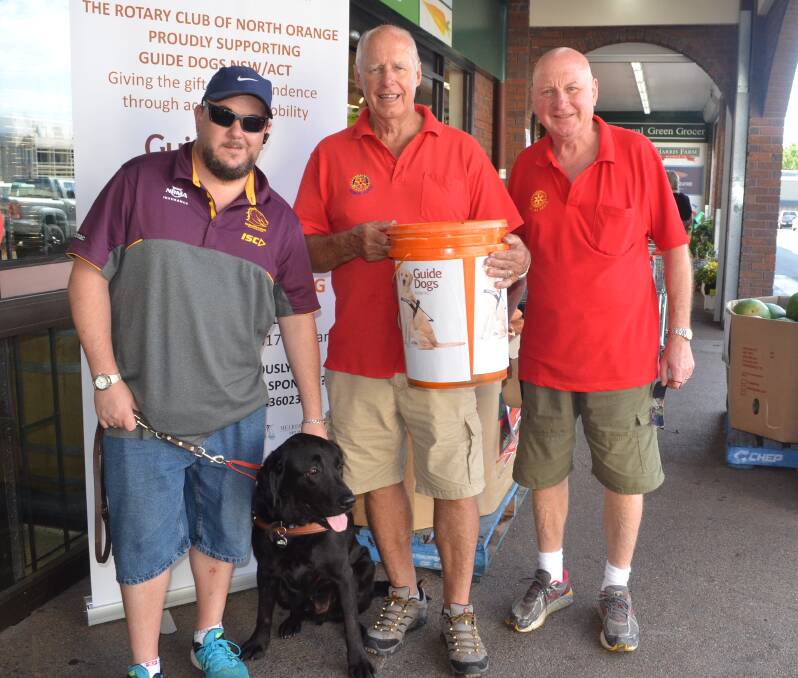 FUNDRAISING DRIVE: Guide Dogs NSW/ACT PR spokesman Matt Bryant and Bronco, with Rotary Club of North Orange volunteers Ian Davidson and David Driscoll who are trying to raise $35,000 to get a guide dog for the region.  