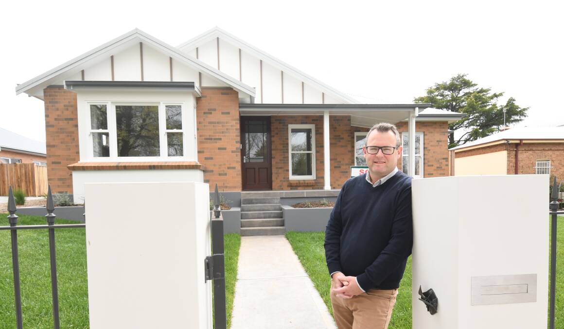 KITE STREET FLIES HIGH: David Dent outside 49 Kite Street, which sold for $2 million, one of the highest house prices achieved in central Orange. Photo: Jude Keogh