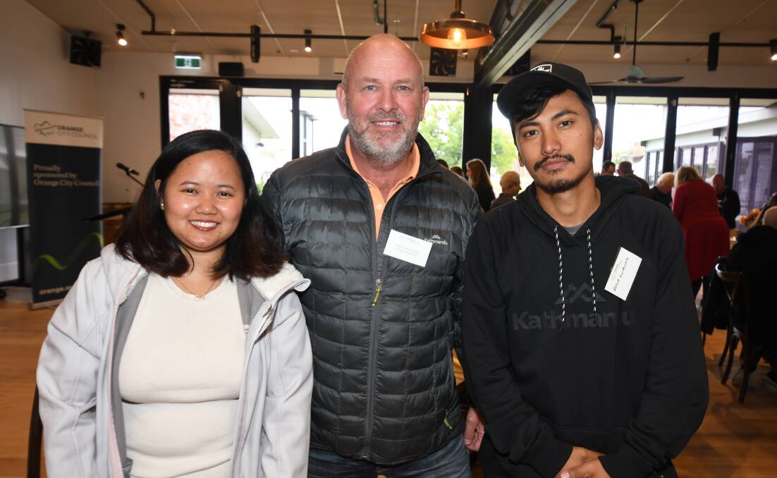 NEW RESIDENTS: Kushumita Gurung, mayor Jason Hamling and Anup Gurung who relocated to Orange from Sydney after moving to Australia from Nepal. Photo: CARLA FREEDMAN