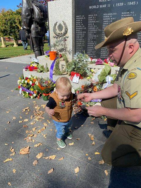 WREATH LAYING: Logan and Aaron Willis couldn't attend an Anzac Day service or march this year but they still laid a wreath at the cenotaph on Saturday. Photo: SUPPLIED