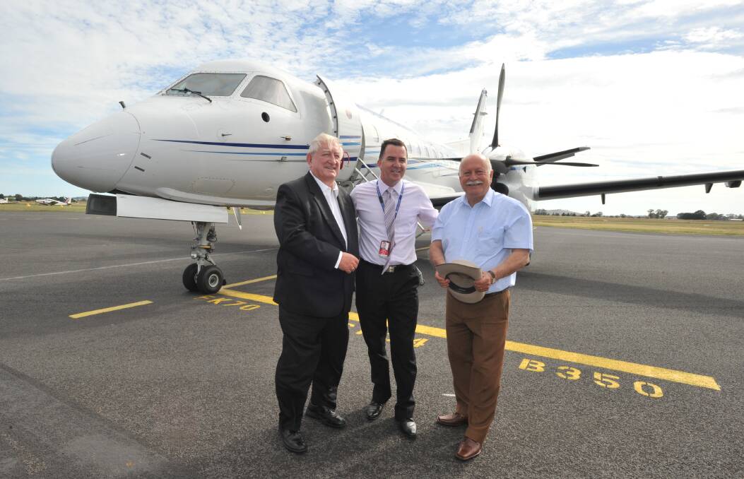 A plane landed at Orange Airport on Tuesday as part of the launch of direct flights between Orange and Brisbane that will start on February 20. Photos: JUDE KEOGH
