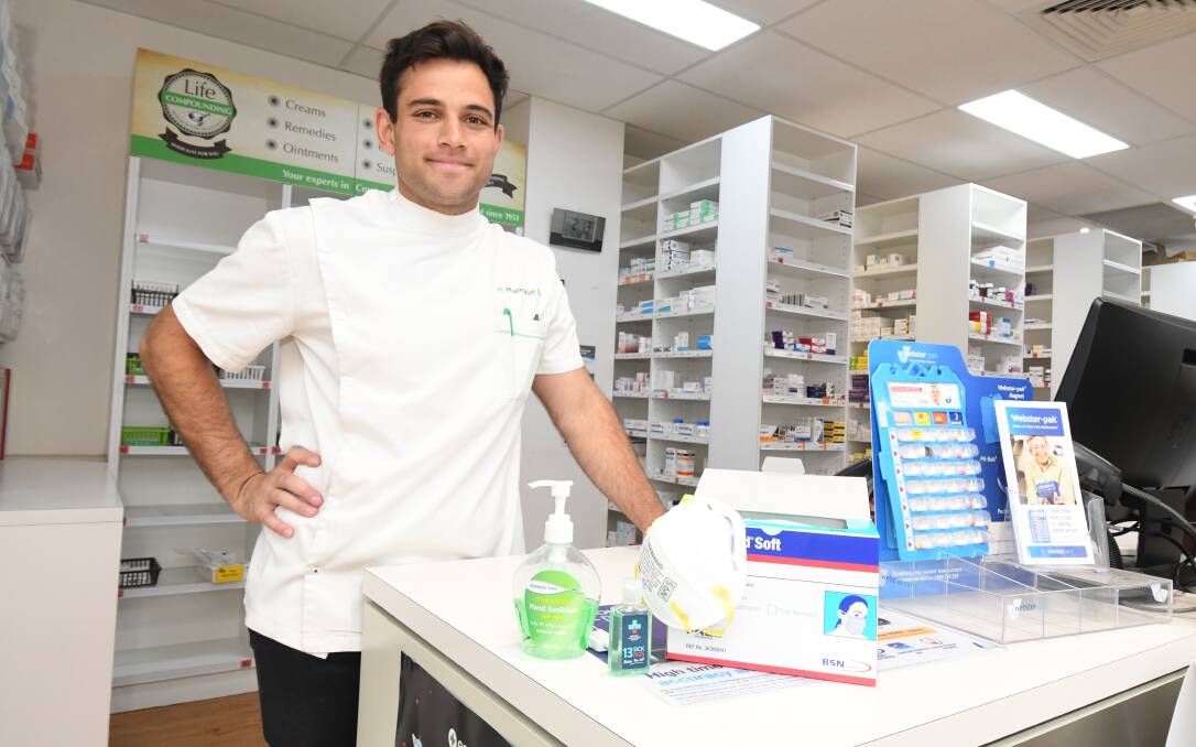 RUNNING LOW: McCarthy's Pharmacy pharmacist Jamil Khalfan has a mask for mixing medications but is otherwise out of P1 and P2 masks after the bushfires. Photo: JUDE KEOGH 