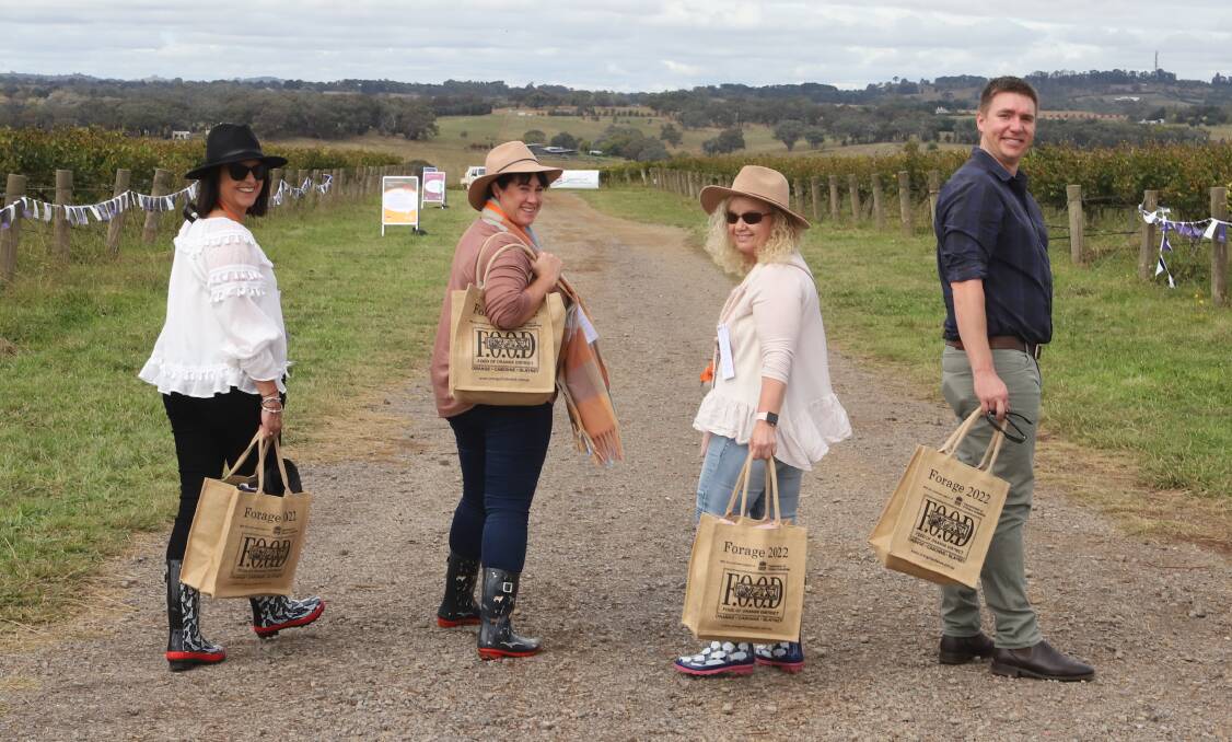 SUSTAINABLE EVENT: Cally Woodhouse, Kim Dickerson, Christine Whybrow and Ben McNiven with their reusable FOOD Week bags at Forage earlier this year. Photo: CARLA FREEDMAN 