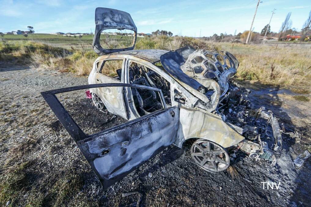 DESTROYED: A car was destroyed by fire in the early hours of Wednesday morning. Photo: TROY PEARSON
