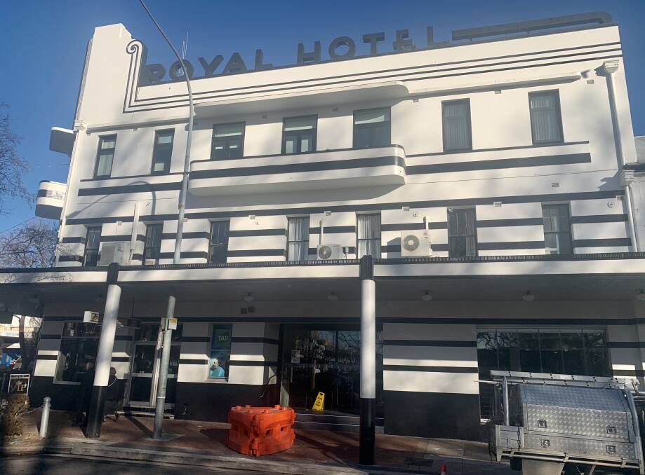 MOPPING UP: There was an early morning clean up at Royal Hotel on Thursday morning after flooding overnight on Wednesday. Photo: TRACEY PRISK