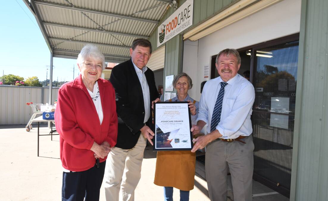 WIN: Tidy Towns Committee member Wendy Fisher, mayor Reg Kidd, Anne Hopwood from Foodcare and Tidy Towns committee chairman Kevin Duffy. Photo: FOODCARE