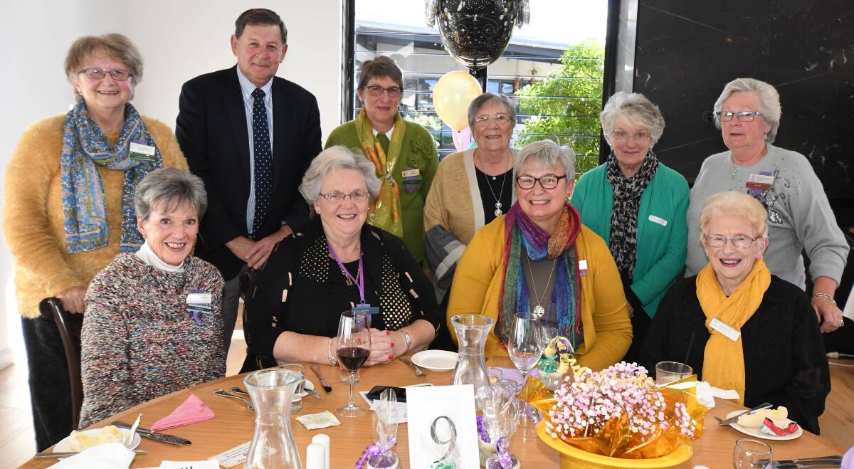 PARTY TIME: Orange Day VIEW Club members Susan Walsh, mayor Reg Kidd, Cheryl Lobsey, Vicky Phelan, Pat Daly, Pamela Penhall, Pat Lodge, president Andre White, zone councillor Therese Welsh and Joan Dally. Photo: JUDE KEOGH