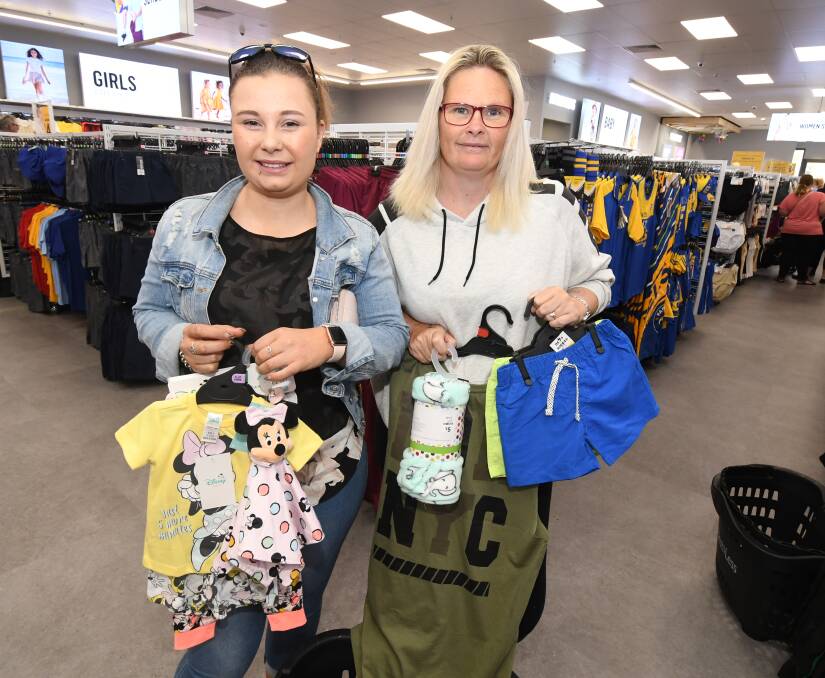 KEEN SHOPPERS: Chloe and Julie Dittmar were among the first shoppers at the new Best and Less store in Anson Street. Photos: JUDE KEOGH