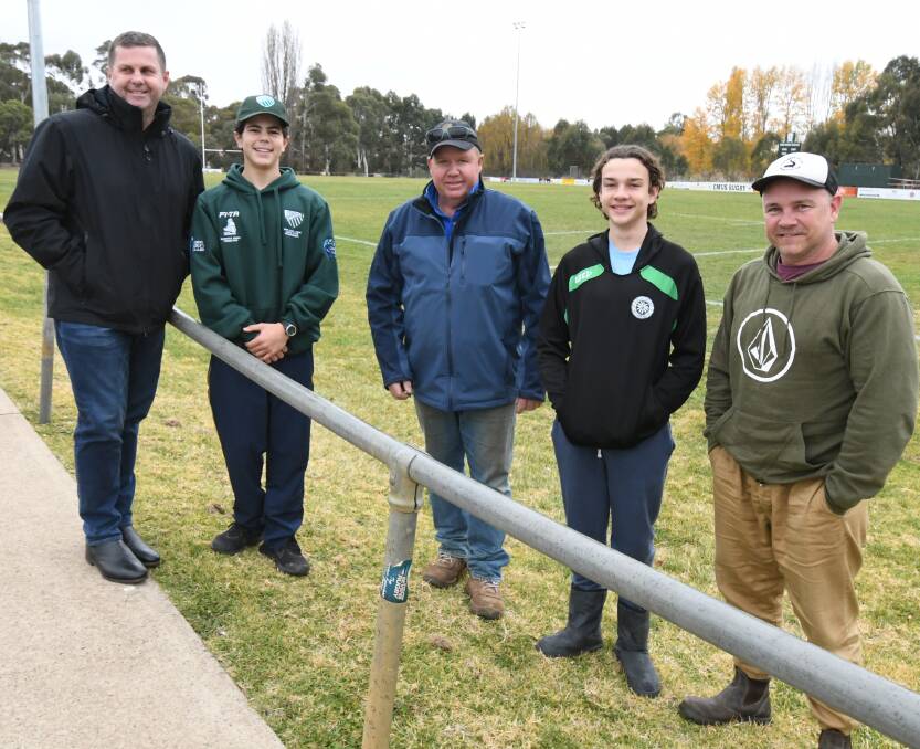 BIG WEEKEND: Paul and David Whitehouse from Randwick and organiser Deryck Ward with Jett and Shane Fender check out the Emus pitch. Photo: JUDE KEOGH