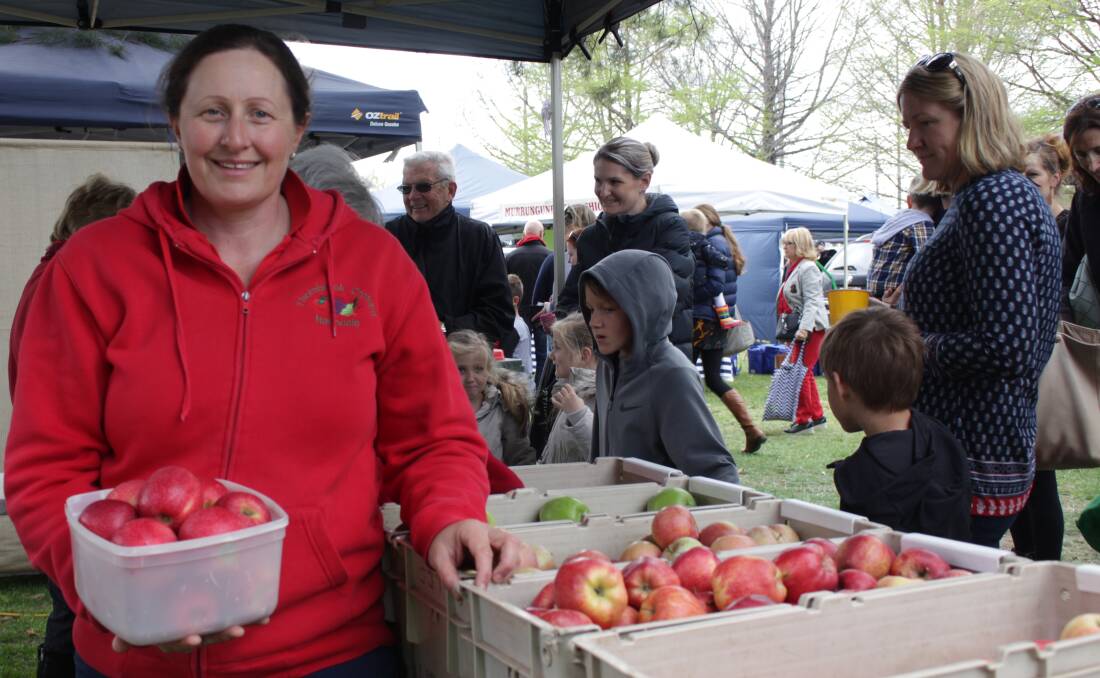 CANCELLED: Market president Paula Charnock from Thornbrook Orchard will sell apples on Saturday but families will be discouraged from attending the market. TAKEN BEFORE SOCIAL DISTANCING RULES.