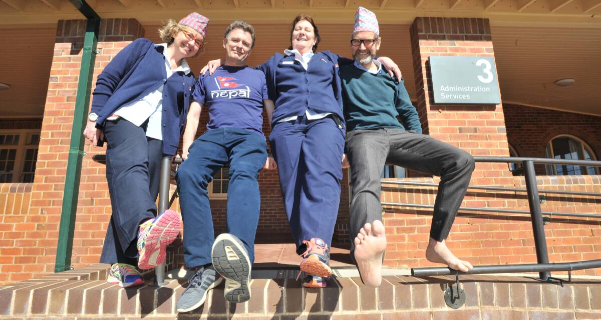 STEPPING OUT: Shelley Tait, Peter Warren, Elizabeth Connaughton and Nick Burns are taking part in a five kilometre fundraising walk on Saturday. Photo: JUDE KEOGH 