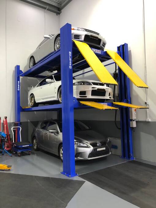SPACE SAVER: A three-car stacker built by Huntsman Engineering in Sydney. Photo: SUPPLIED