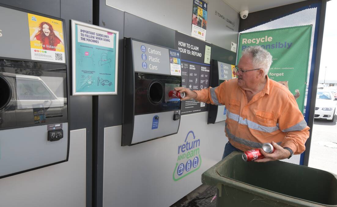 RECYCLING: Tom Cole brought seven wheelie bins full of bottles and cans to the Return and Earn at North Orange on Tuesday and welcomed the idea of a third machine for the centre of town. Photo: JUDE KEOGH 