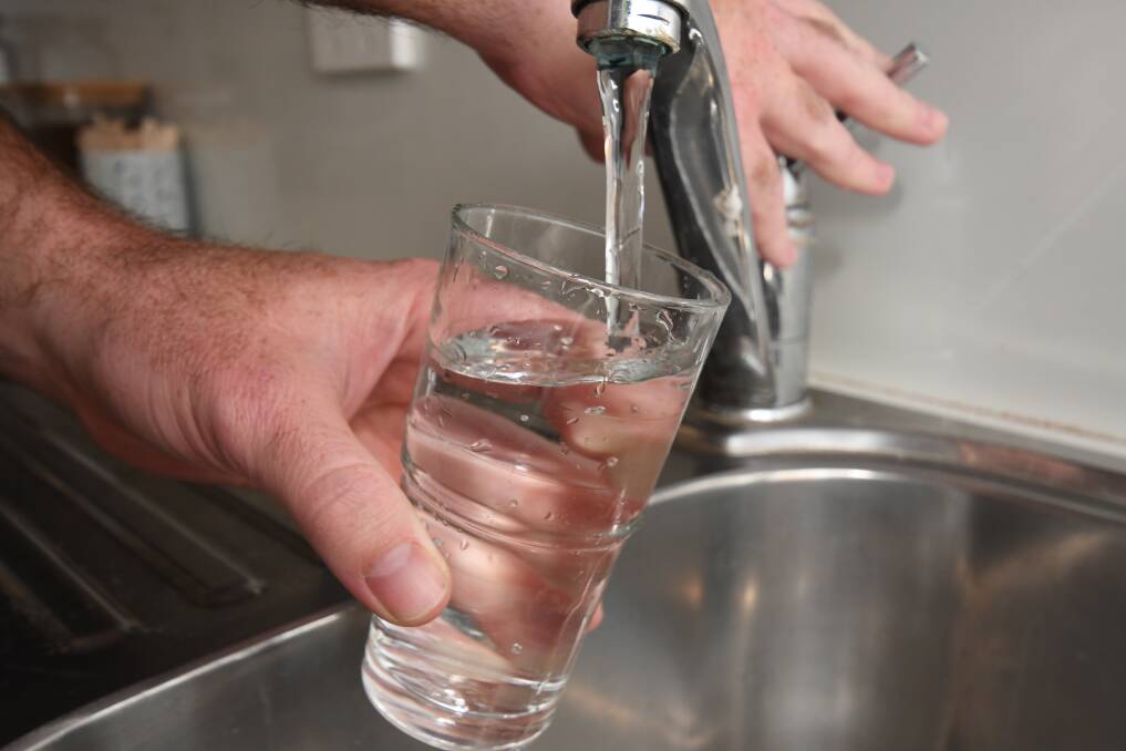 DRINKING WATER: Tap water has been smelling a little odd in Orange recently. Photo: JUDE KEOGH