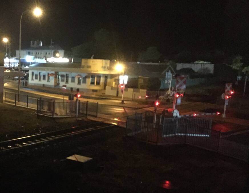 SET-OFF BY STORM: Traffic was diverted away from the level crossing at Summer Street when the crossing was activated on Monday night. 