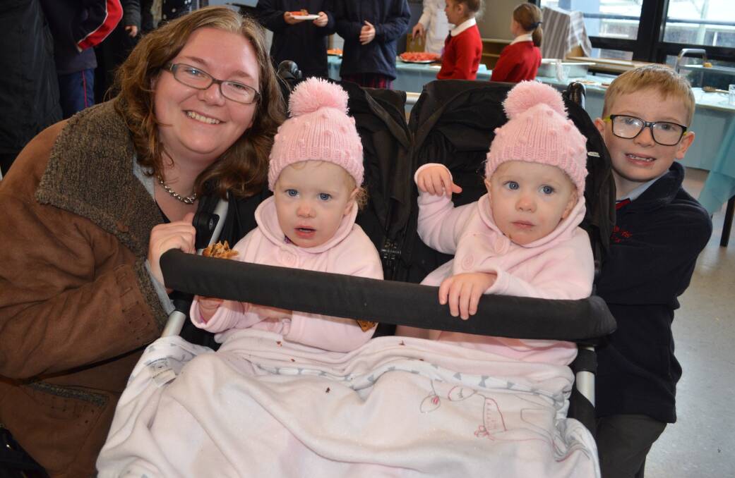 LOVE AND FAMILY: Amanda Johnson with her 20-month-old twins Grace and Bethany and son Bradley at the Orange Christian School Mother's Day breakfast. 