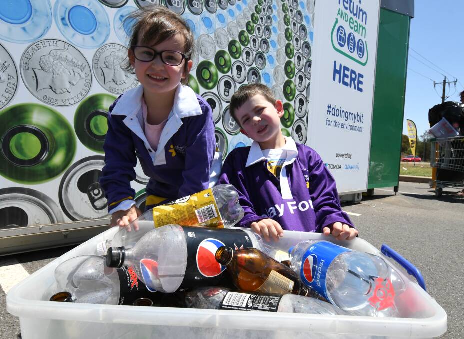 DOUBLE DEED: Sophie, 6, and Nicholas Culverson, 3, are collecting cans and bottles to put through the Return and Earn machine with proceeds going to the Relay for Life.