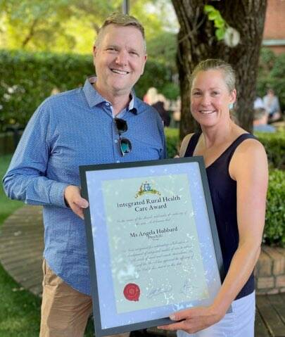 WINNER: Rural and Remote Medial Services CEO Mark Burdack with award winner Angela Hubbard from PhyzX2U in Orange. Photo: SUPPLIED