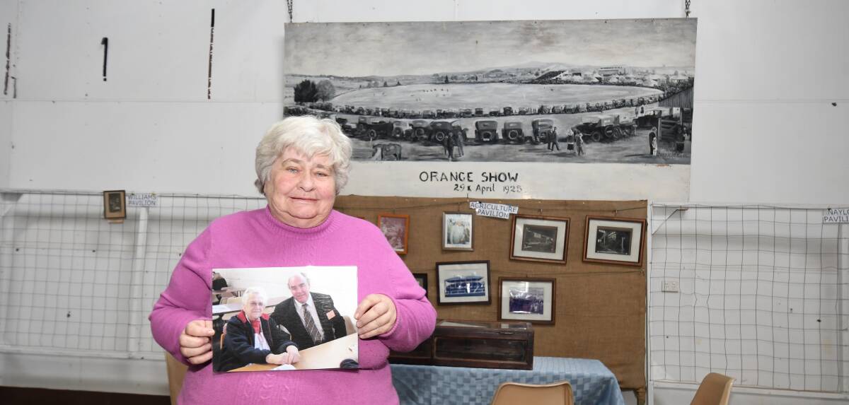 SHOW HISTORY: Orange Show historian Sue Milne with a photograph of former show stalwarts Betty and Peter Naylor. Photo: JUDE KEOGH