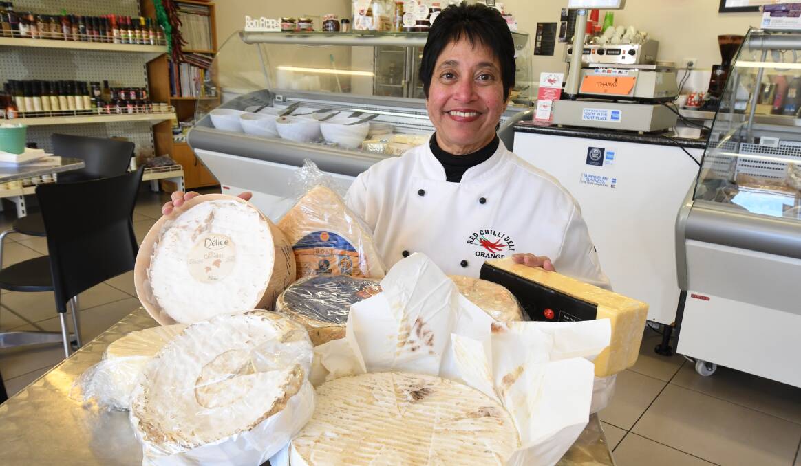 SUPPORT FOR RENAMING: Red Chili Deli owner Ayoma Gooneratne with a selection of cheeses. Photo: JUDE KEOGH 