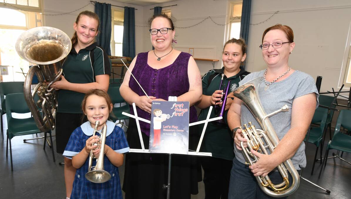 WEEKEND PERFORMANCES: Matika Fraser, Joanna Routh, City of Orange Brass Band acting band master Megan Hodsdon, Cheyanne Lonsdale and Kelly-Ann Roth are embracing a change in the band's repertoire. Photo: JUDE KEOGH