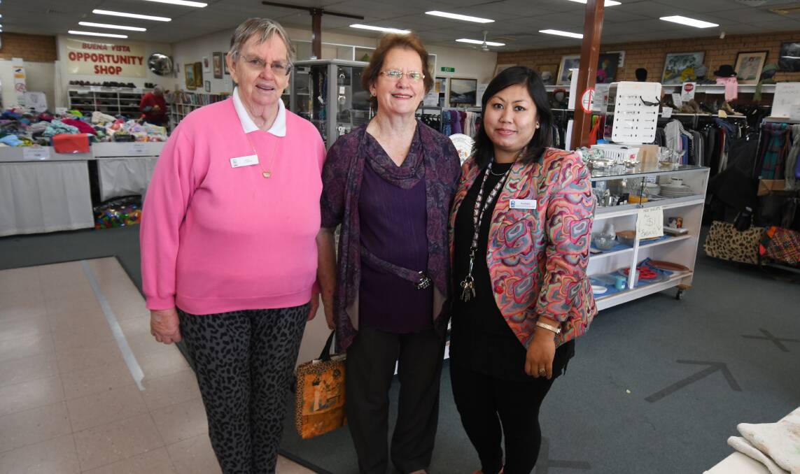 ANNIVERSARY: Buena Vista charity shop volunteer Beryl Reid, retiring manager Irene Dwight and new manager Nisheta Tripura. Photo: JUDGE KEOGH 
