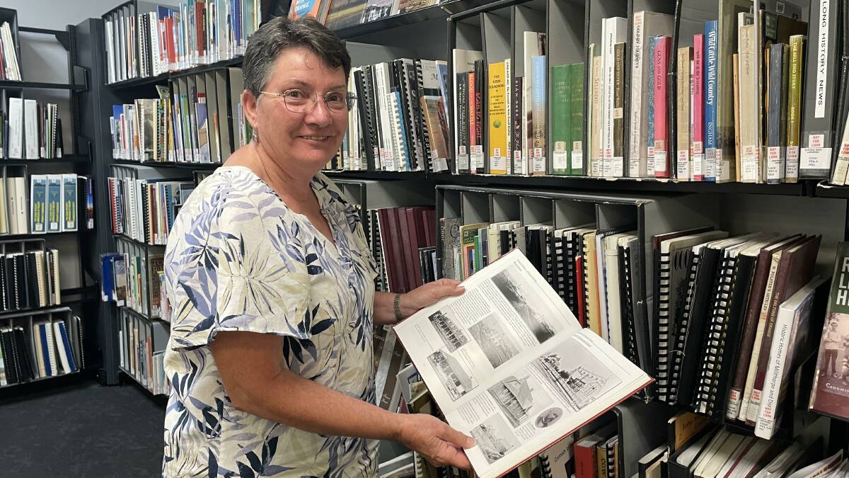 Julie Sykes from Orange Family History Group with some of the resources in the local studies room at Orange City Library. Picture by Tanya Marschke