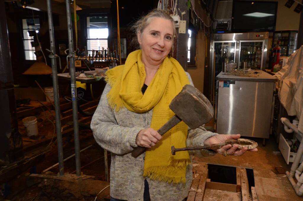 CONSTRUCTION SITE: Joanne Murphy with a mallet found during the refurbishment at the Metropolitan Hotel. Photo: JUDE KEOGH
