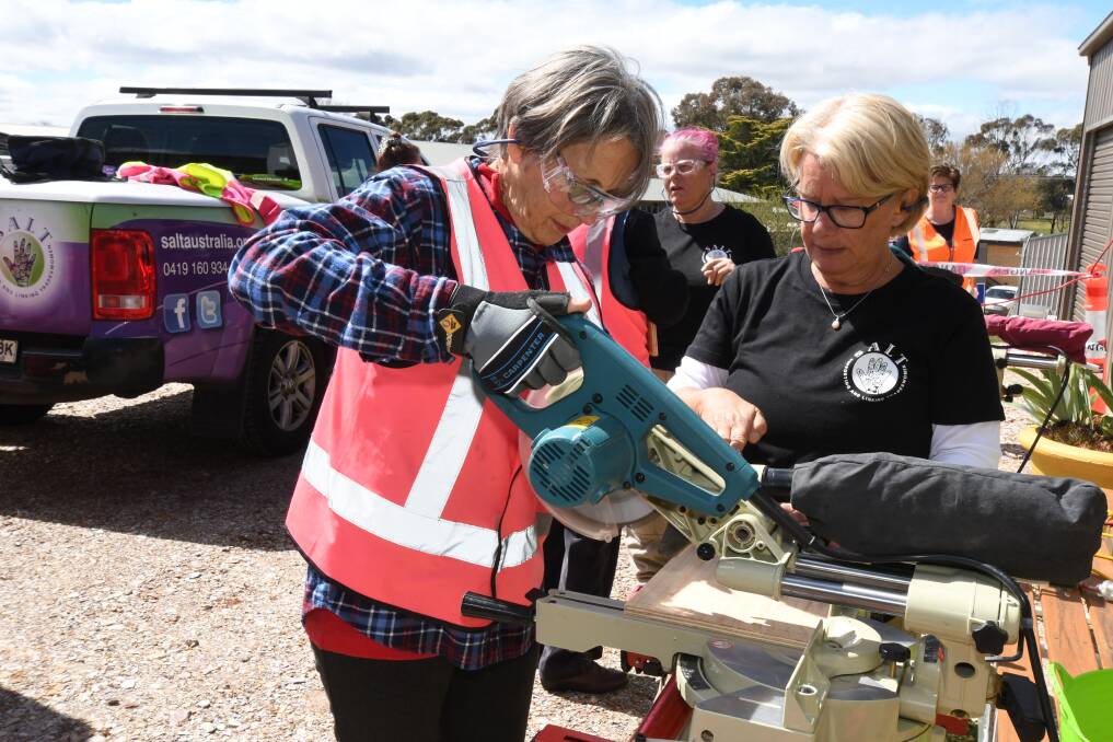 Orange Women's Shed members and visitors took part in a tool workshop run by Supporting and Linking Tradeswomen (SALT) on Wednesday. Photos: JUDE KEOGH
