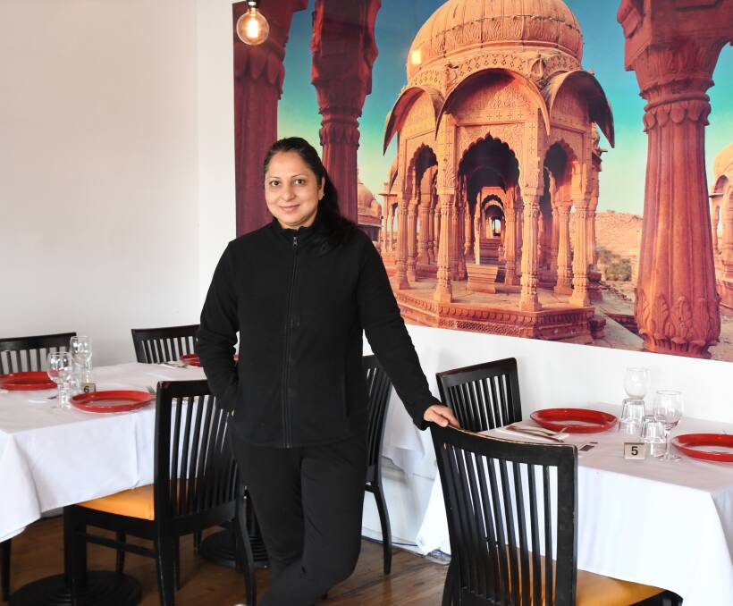 RELOCATED: Thar Indian Cuisine owner Madhu Sarswat at the new restaurant. Photo: JUDE KEOGH