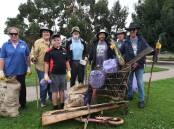 Clean Up Australia Day volunteers Tracey Wilson, Rosemary Stapelton, Tyler Wilson, Nick King, Patrick Driver, Colin Foster, Robert Mclaughlin with some of their haul last year. Picture by Carla Freedman