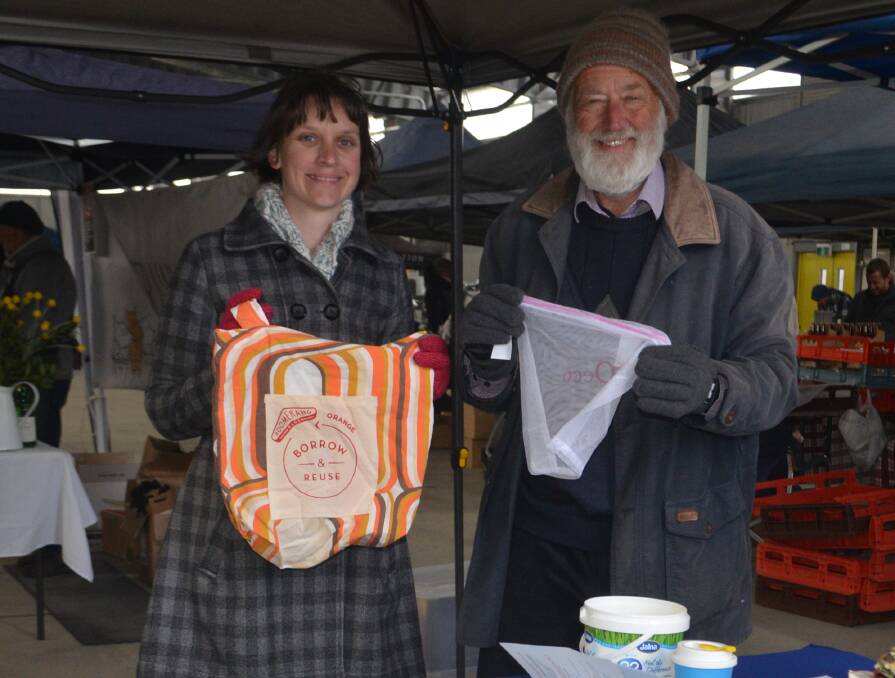 PLASTIC FREE: ECCO member Alison Almond and president Nick King with a Boomerang Bag and reusable bag for carrying fruit or vegetables.
