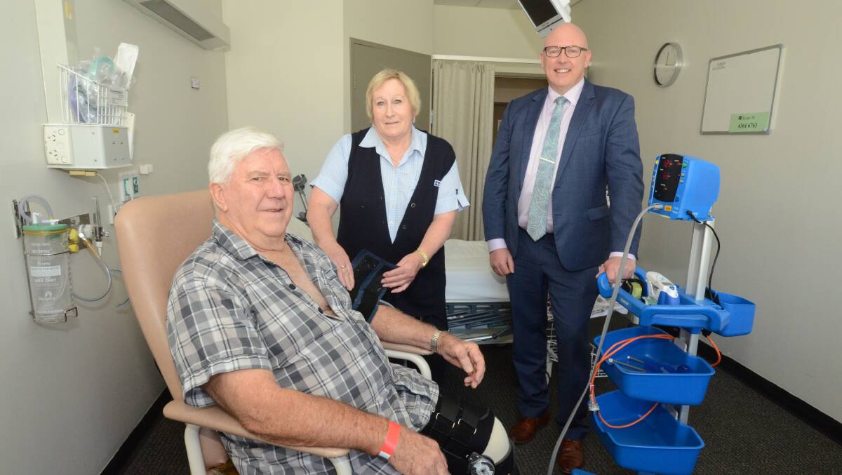 Bill Purser with registered nurse Dot Faye and Dudley Private Hospital CEO and director of clinical services Paul McKenna. Photo: JUDE KEOGH