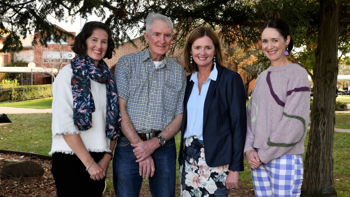John Clarke with his daughters Helen Clarke, left, Michelle Whiteley and Gabrielle Logan who all work together at James Sheahan Catholic Highschool. Picture by Carla Freedman.