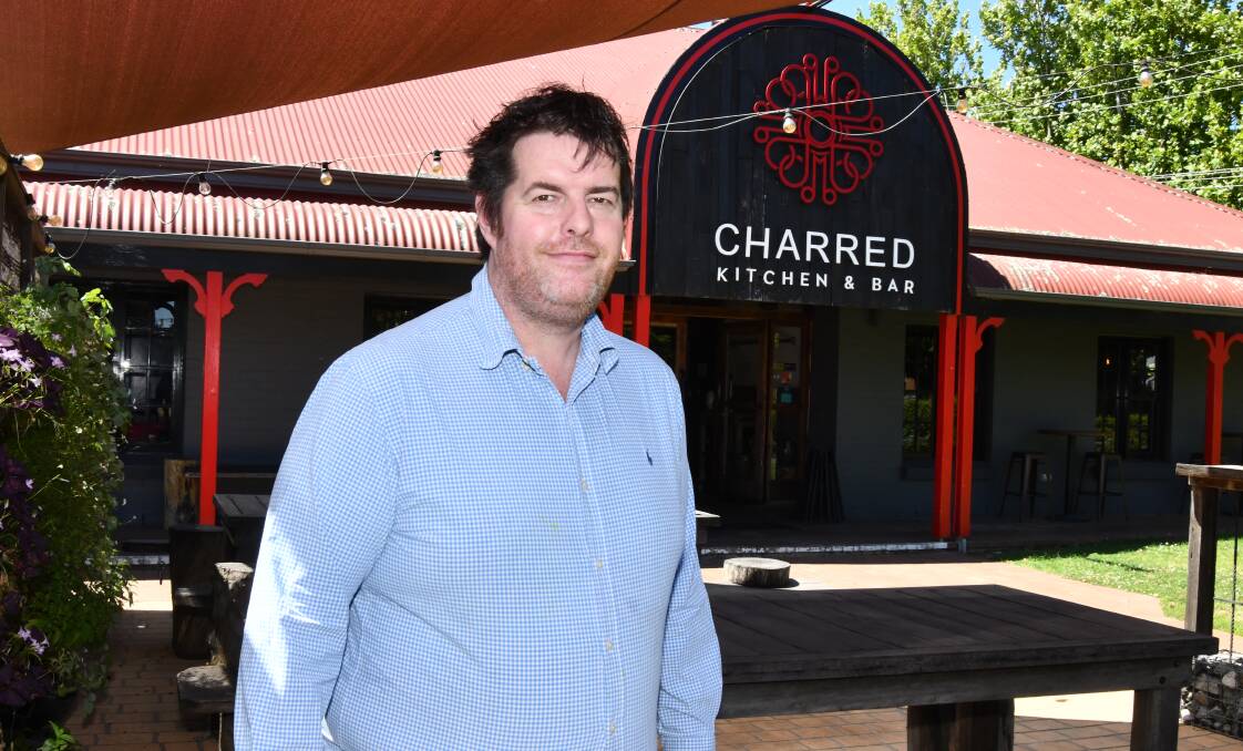 David Collins from Charred Kitchen & Bar is delighted at the restaurant being two hats and 14 points by the Australian Good Food Guide. Picture by Carla Freedman