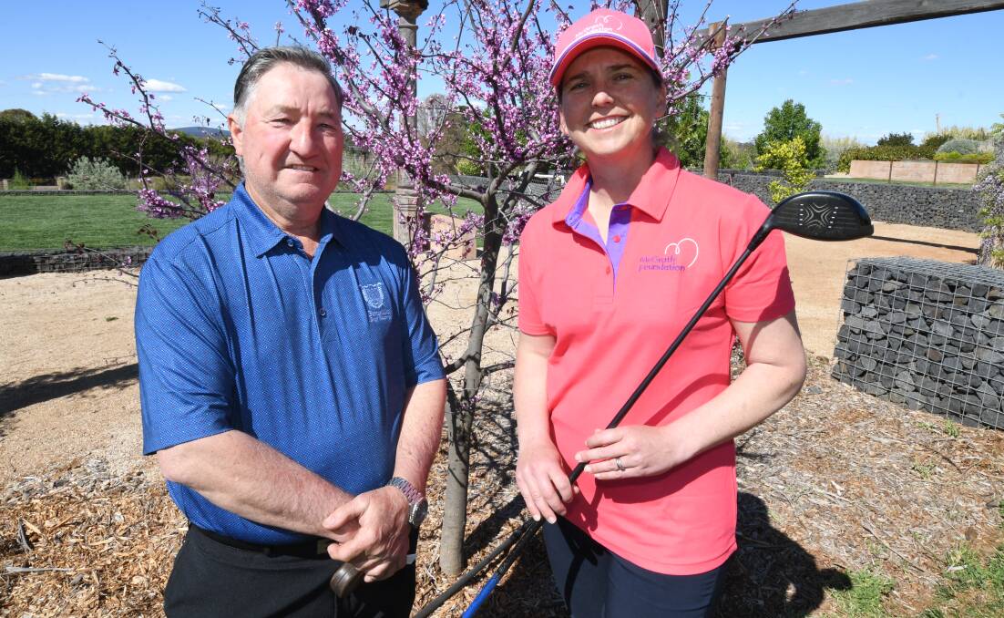 PINK GOLF DAYS: John Davis and Jo Hunter are raising money for the McGrath Foundation breast care nurses with charity golf days. Photo: JUDE KEOGH