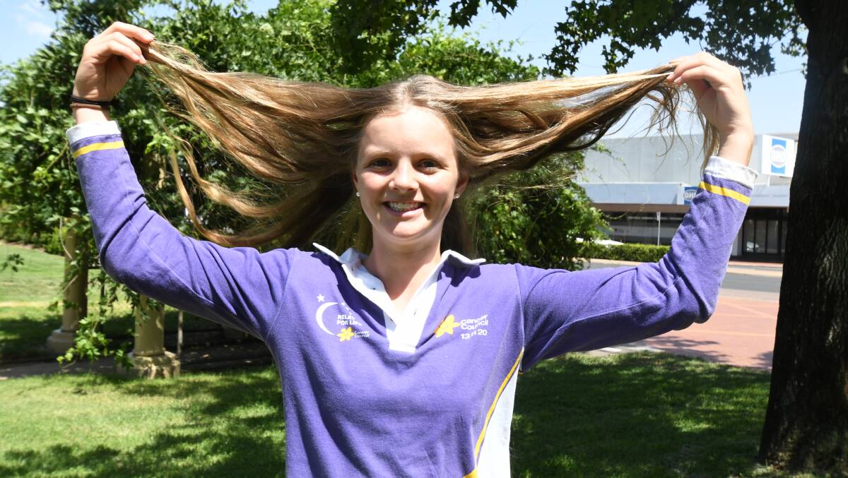 FUNDRAISING CUT: Ella Lamrock will chop off her locks at the Relay for Life and is enouraging others to join her. Photo: JUDE KEOGH
