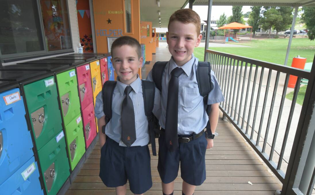 EAGER TO LEARN: Kindergarten student Robbie Bourke is eager to join his older brother Toby at Orange Anglican Grammar School. Photo: JUDE KEOGH 