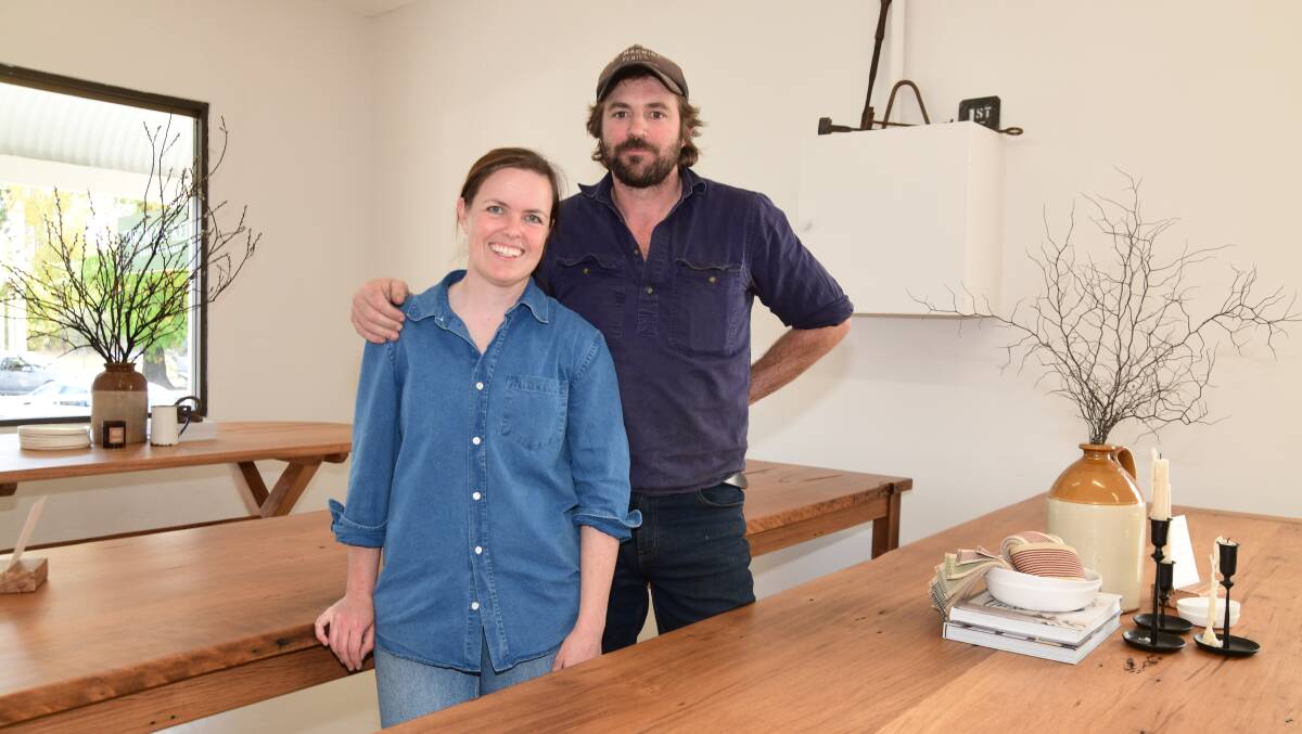 Maddy and Thomas Baker in the new showroom with some of their bespoke tables. Picture by Carla Freedman
