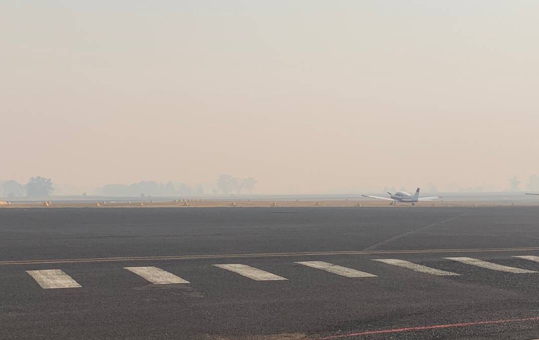 SMOTHERED: Heavy smoke at Orange Airport. Photo: TRACEY PRISK
