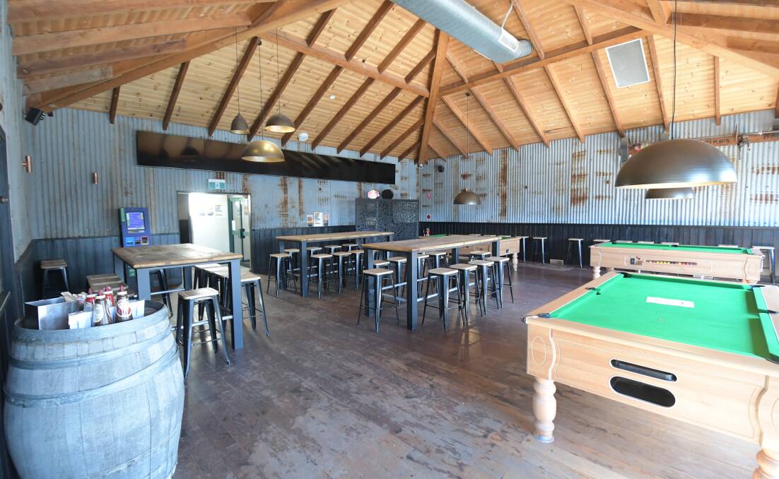 POOL SHARKS WELCOME: The Gladstone Hotel has opened its back room and introduced pool tables. Photo: CARLA FREEDMAN