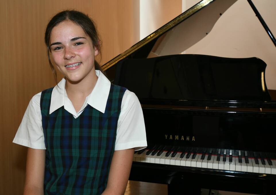 ON SONG: Kinross Wolaroi School year 9 student Maddie Hook won a regional award at a national poetry competition with Mahogany Bones. Photo: CARLA FREEDMAN