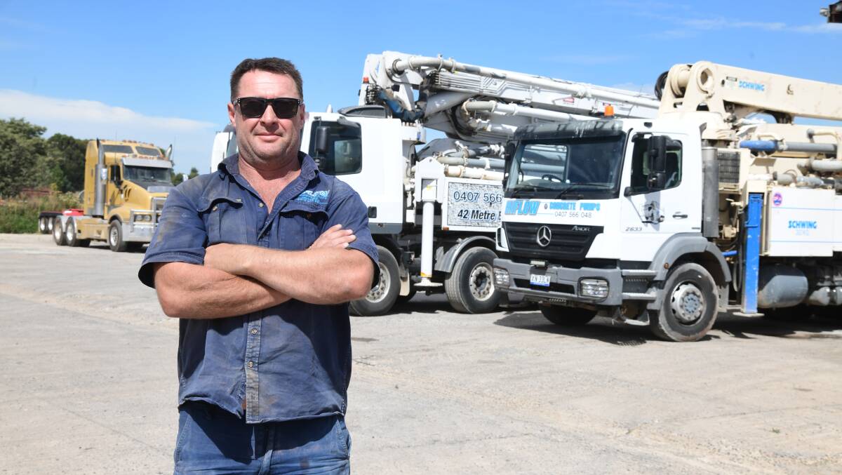 Ryan Prevett from Hiflow Concrete Pumps with his trucks. Picture by Carla Freedman