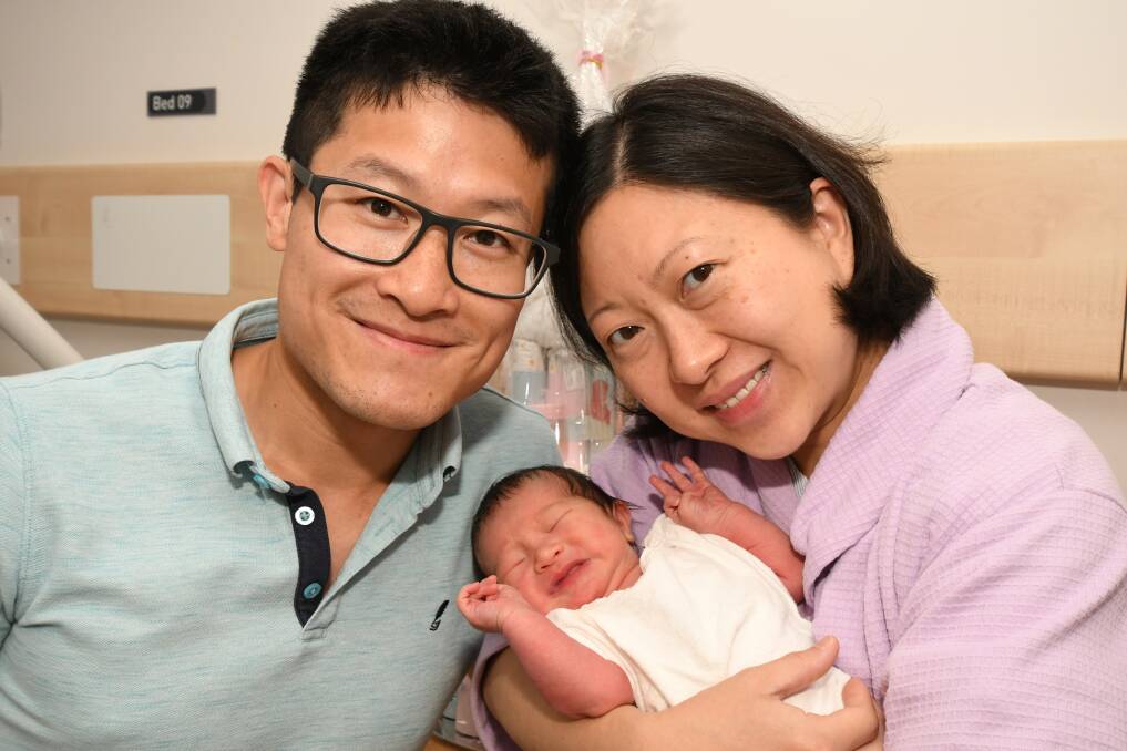 CHRISTMAS JOY: John Wai and Jacqueline Chan welcomed baby Jansen on Christmas Day. Photo: JUDE KEOGH