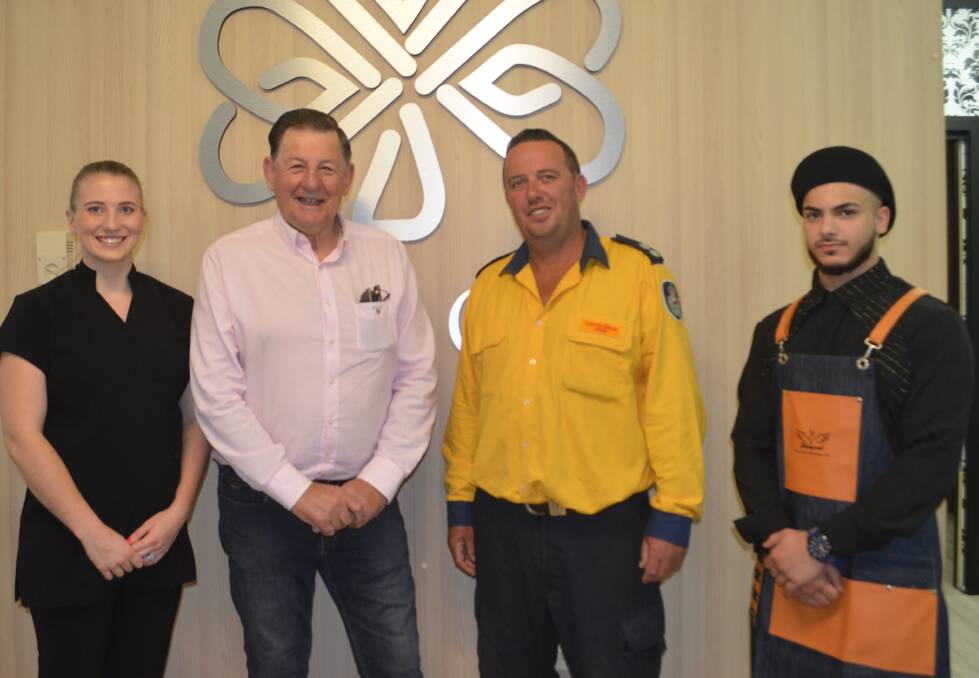 SUPPORTING FIREFIGHTERS: Bree's Own Platinum Barbering owner Bree Pollet, with mayor Reg Kidd and Clifton Grove Rural Fire Service volunteer Glenn Foley-Gallagher after their haircuts with barber Memoe Jarallah.