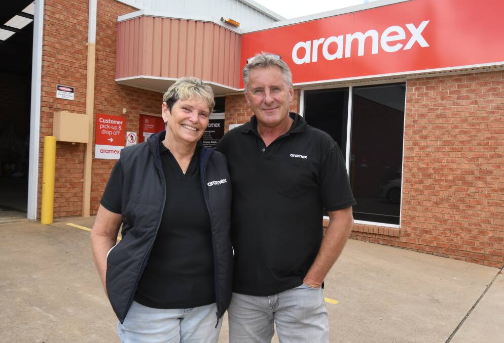 SEMI-RETIREMENT: Franchisees Karen and Michael Andrew are selling Aramex. Photo: JUDE KEOGH
