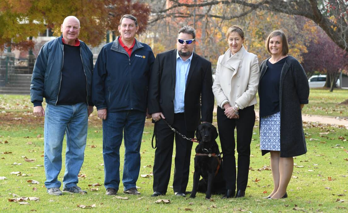 GUIDE DOG FUNDING: Rotary Club of Orange North guide dog fundraising coordinator David Driscoll, immediate past president Steve Jackson, Matt Bryant and Bronco, with Guide Dogs NSW/ACT vice president Lindy Druitt and community fundraising coordinator Rebecca Hedger. Photo: JUDE KEOGH