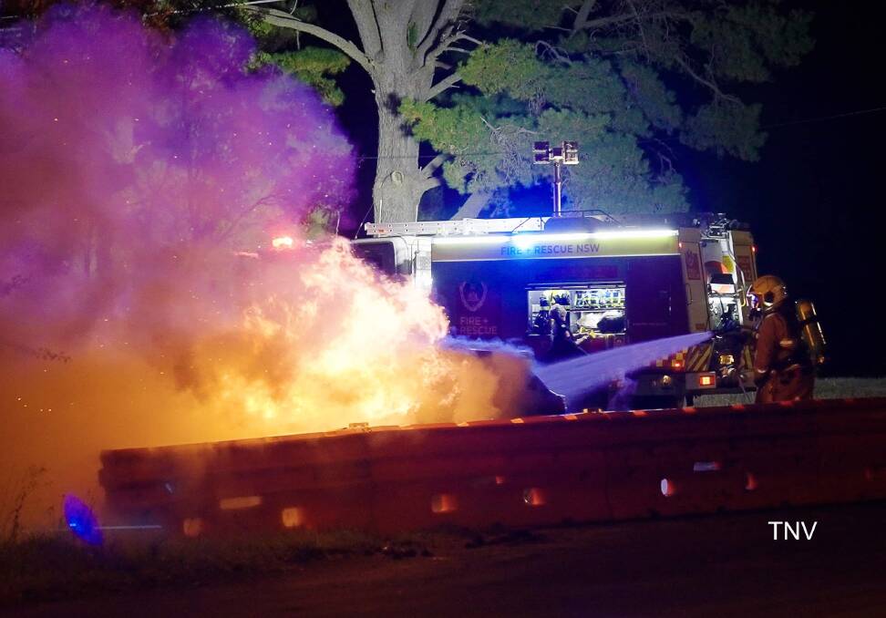 ALIGHT: Firefighters extinguished a car fire in Orange on Monday night. Photo: TROY PEARSON